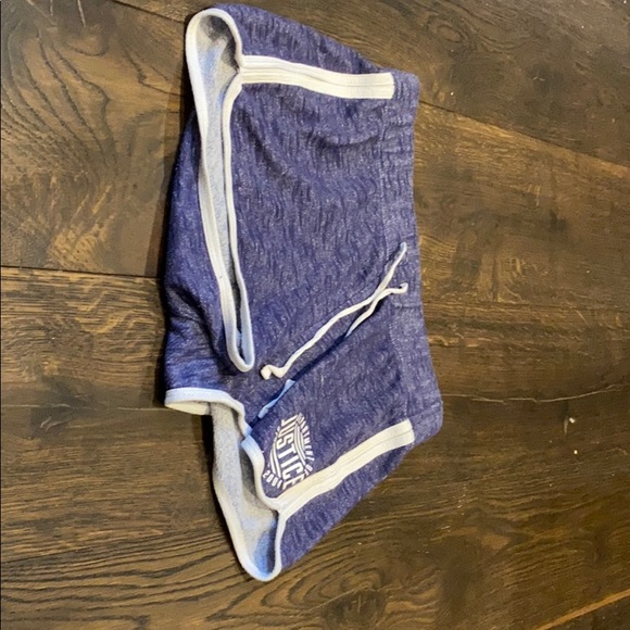 2 pairs of black shorts and 1 pair of blue shorts. - Picture 6 of 8